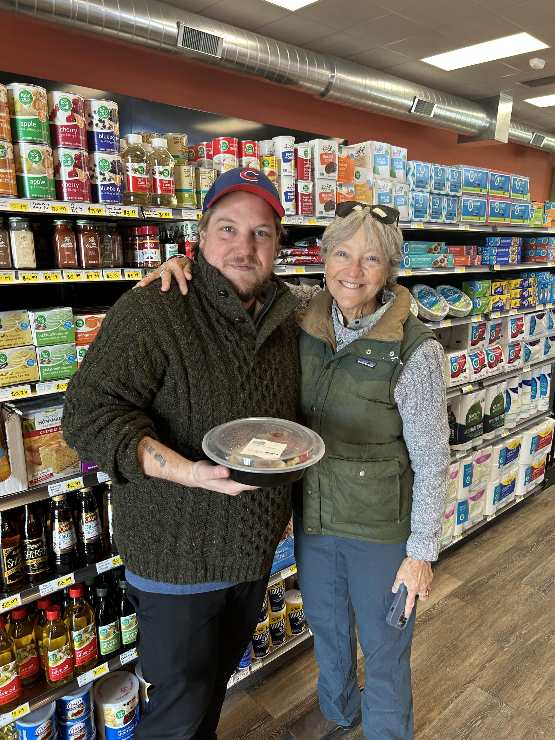 Philip Hamilton at the Cultivate Hope Corner Store with his mother, Grace